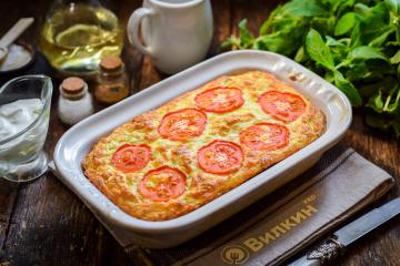 Casserole Zucchini dengan keju di dalam oven